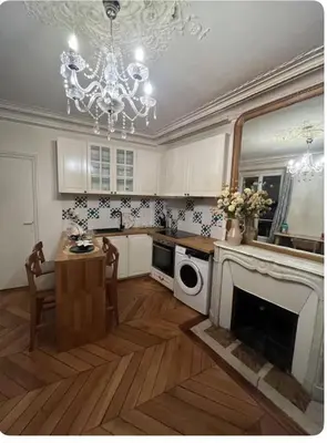 Cuisine ou kitchenette dans l'établissement Cozy appartement near Opera and Galeries Lafayette Haussmann