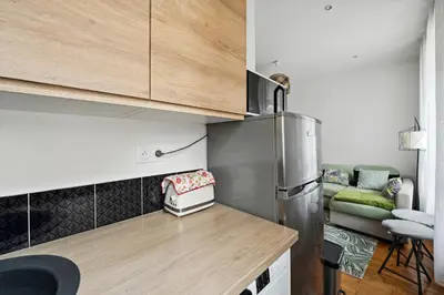 Cuisine ou kitchenette dans l'établissement Le Studaunien - Studio à 7min de Paris