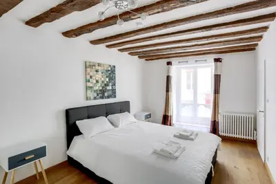 Un ou plusieurs lits dans un hébergement de l'établissement Bluestay 214 - Superb apartment in Paris