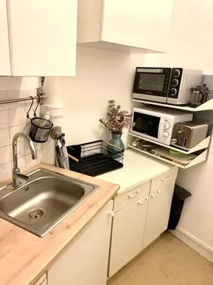 Cuisine ou kitchenette dans l'établissement Full house Canal Saint-Martin