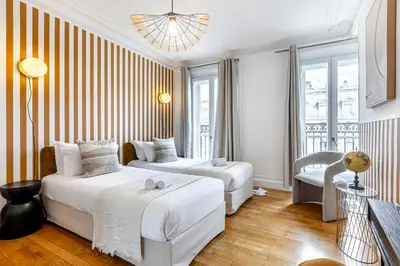 Un ou plusieurs lits dans un hébergement de l'établissement Sweett - Rue Saint-Lazare