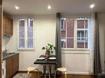 Cuisine ou kitchenette dans l'établissement Parc Montsouris - Longue durée