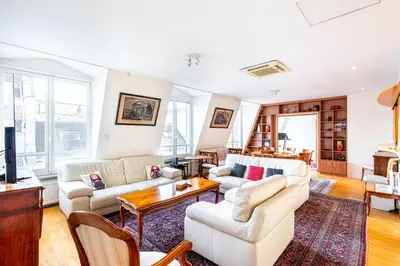 Coin salon dans l'établissement GuestReady - Spacious Comfort in the 8th