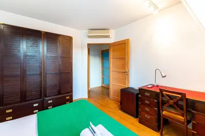 Un ou plusieurs lits dans un hébergement de l'établissement GuestReady - Spacious Comfort in the 8th