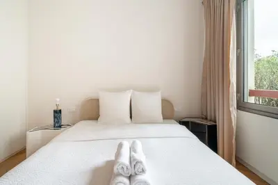 Un ou plusieurs lits dans un hébergement de l'établissement Luxury apartment on Canal Saint Martin
