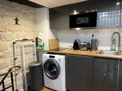 Cuisine ou kitchenette dans l'établissement Lofts Marais Reaumur