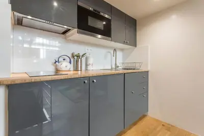 Cuisine ou kitchenette dans l'établissement Lofts Marais Reaumur
