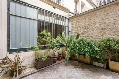 Jardin de l'établissement Lofts Marais Reaumur
