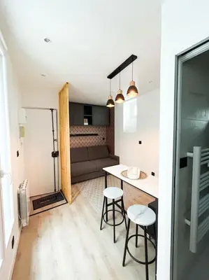 Cuisine ou kitchenette dans l'établissement Studio moderne - Canal St Martin
