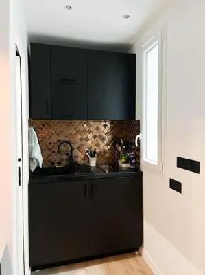 Cuisine ou kitchenette dans l'établissement Studio moderne - Canal St Martin