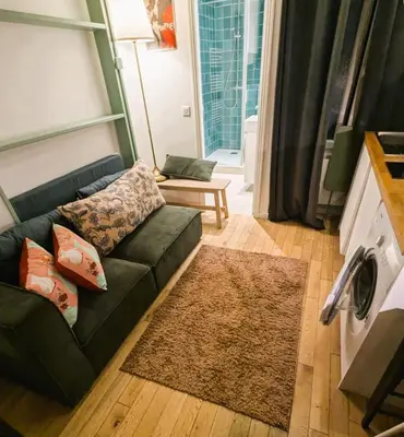 Coin salon dans l'établissement Cozy Nest - Montmartre Caulaincourt