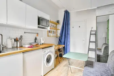 Cuisine ou kitchenette dans l'établissement Cozy Nest - Montmartre Caulaincourt