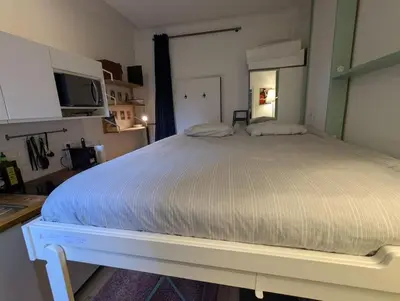 Un ou plusieurs lits dans un hébergement de l'établissement Cozy Nest - Montmartre Caulaincourt