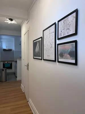 Cuisine ou kitchenette dans l'établissement Le Point d'Eiffel - Au Cœur de Grenelle