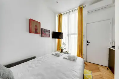 Un ou plusieurs lits dans un hébergement de l'établissement Bluestay 78 - Superb apartment