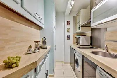Cuisine ou kitchenette dans l'établissement Charming 1BR apartment with terrace Le Marais Paris Center