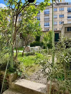 Jardin de l'établissement Spacious & Quiet Flat, Close to Paris Expo
