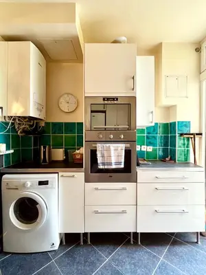 Cuisine ou kitchenette dans l'établissement Spacious & Quiet Flat, Close to Paris Expo