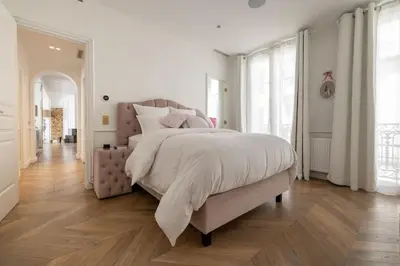Un ou plusieurs lits dans un hébergement de l'établissement Palais Privé Luxe Vue Tour Eiffel Confort Exclusif