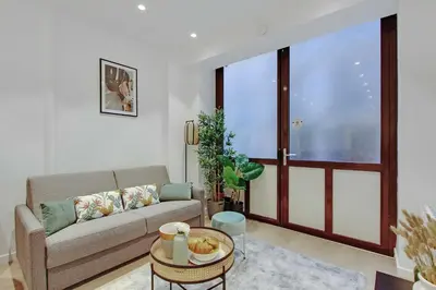 Coin salon dans l'établissement Elegant 1BR - 4P - Eiffel Tower - Trocadero