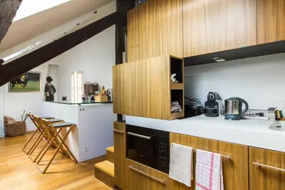 Cuisine ou kitchenette dans l'établissement Small Triplex
