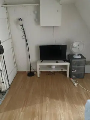 Télévision ou salle de divertissement dans l'établissement Djawed