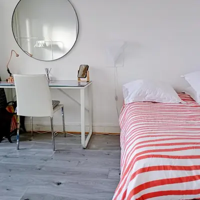 Un ou plusieurs lits dans un hébergement de l'établissement Appartement Paris vue imprenable