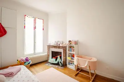 Un ou plusieurs lits dans un hébergement de l'établissement Duplex spacieux, 10 min de Paris