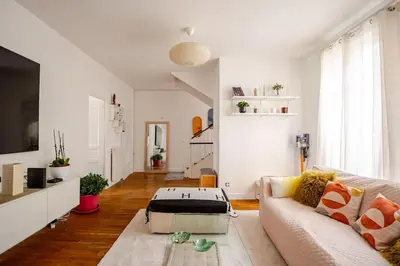 Coin salon dans l'établissement Duplex spacieux, 10 min de Paris