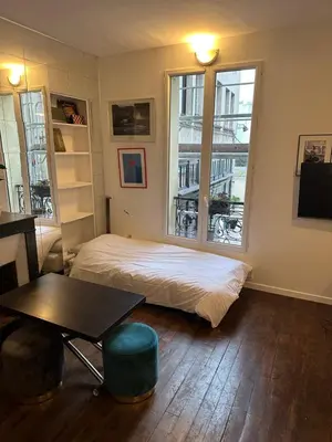 Un ou plusieurs lits dans un hébergement de l'établissement Charmant Studio BASTILLE - Votre Havre de Paix au Cœur de Paris !