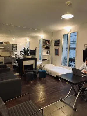 Cuisine ou kitchenette dans l'établissement Charmant Studio BASTILLE - Votre Havre de Paix au Cœur de Paris !