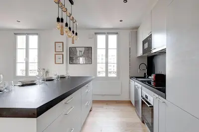 Cuisine ou kitchenette dans l'établissement Suite Modern Art - Superbe appartement