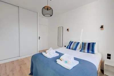Un ou plusieurs lits dans un hébergement de l'établissement Suite Modern Art - Superbe appartement