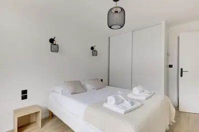 Un ou plusieurs lits dans un hébergement de l'établissement Suite Dolce Vita - Superbe Appartement