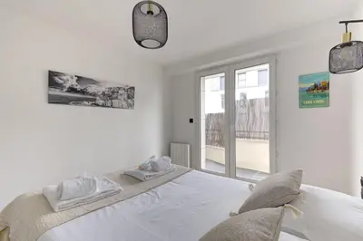 Un ou plusieurs lits dans un hébergement de l'établissement Suite Dolce Vita - Superbe Appartement