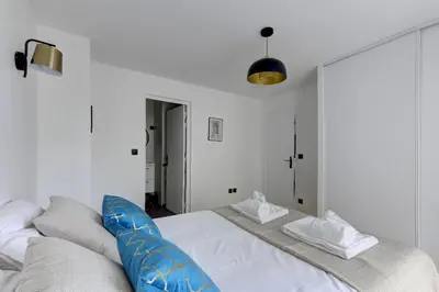 Un ou plusieurs lits dans un hébergement de l'établissement Suite Fes - Superbe appartement