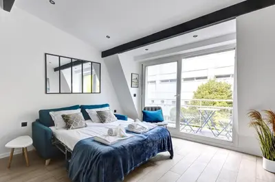 Un ou plusieurs lits dans un hébergement de l'établissement Suite New Delhi - Superbe Appartement