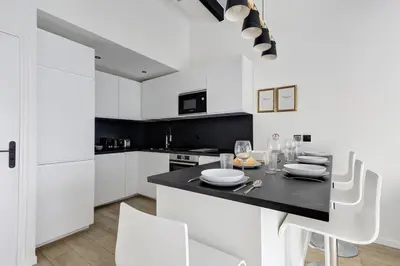 Cuisine ou kitchenette dans l'établissement Suite New Delhi - Superbe Appartement
