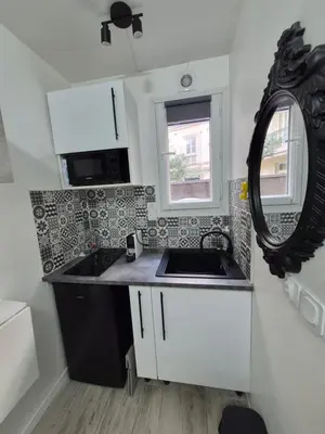 Cuisine ou kitchenette dans l'établissement Studette cosy ideal pour un séjour parisien métro Duroc