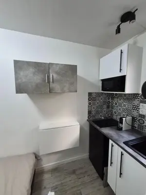 Cuisine ou kitchenette dans l'établissement Studette cosy ideal pour un séjour parisien métro Duroc