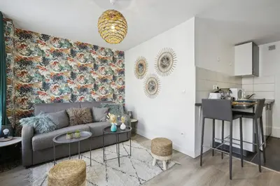 Coin salon dans l'établissement Bluestay 144 - Charming apartment in Asnieres