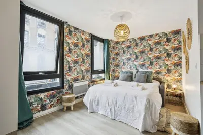 Un ou plusieurs lits dans un hébergement de l'établissement Bluestay 144 - Charming apartment in Asnieres