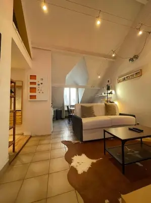 Un ou plusieurs lits dans un hébergement de l'établissement Cosy appartement place des Abbesses-Sacré-Cœur !