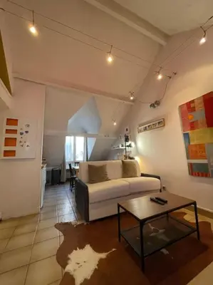Un ou plusieurs lits dans un hébergement de l'établissement Cosy appartement place des Abbesses-Sacré-Cœur !