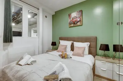 Un ou plusieurs lits dans un hébergement de l'établissement Bluestay 157 - Superb apartment