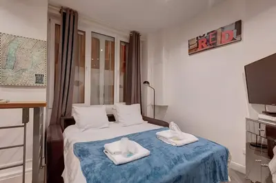Un ou plusieurs lits dans un hébergement de l'établissement Bluestay 200 - Superb apartment