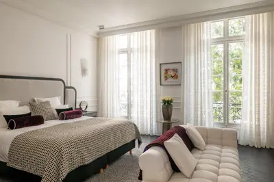 Un ou plusieurs lits dans un hébergement de l'établissement HIGHSTAY - Luxury Serviced Villa - Poincaré