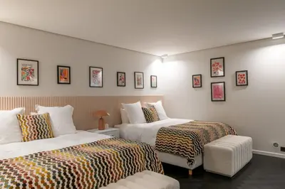 Un ou plusieurs lits dans un hébergement de l'établissement HIGHSTAY - Luxury Serviced Villa - Poincaré