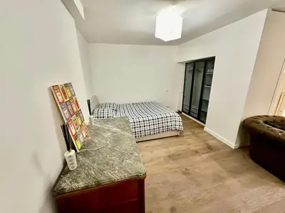 Un ou plusieurs lits dans un hébergement de l'établissement Charmant studio 37m2 Jardin privatif