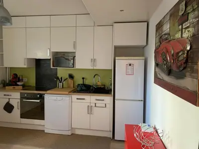 Cuisine ou kitchenette dans l'établissement Appartement cosy - Paris La Défense